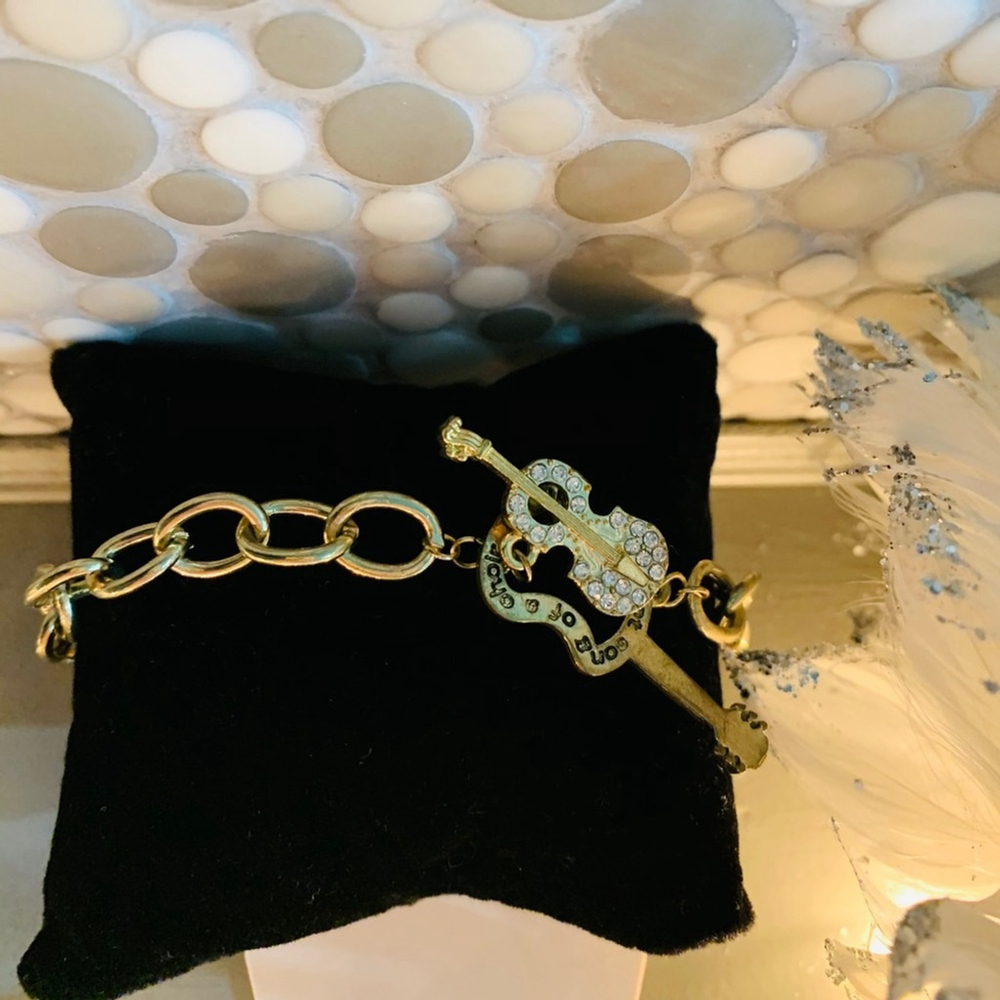 BR8- Universal Language brass bracelet